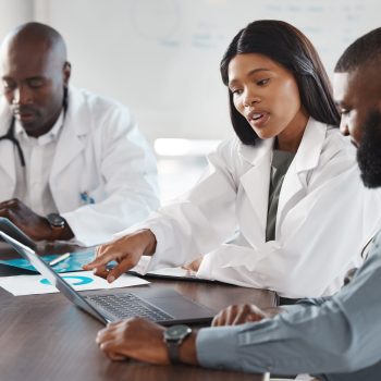 Doctors and accountant or b2b planning hospital finance report, budget or accounting with online ppt. Chart, graph and data analysis teamwork of businessman and medical healthcare worker planning.